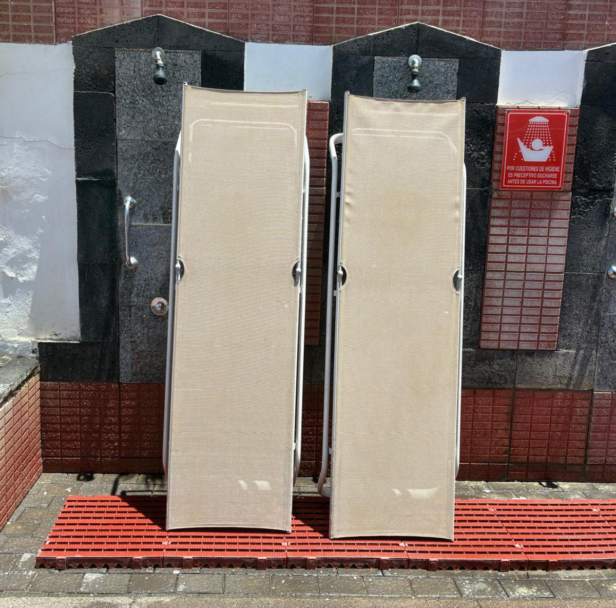 Sun loungers after professional outdoor cleaning by Clean Sur