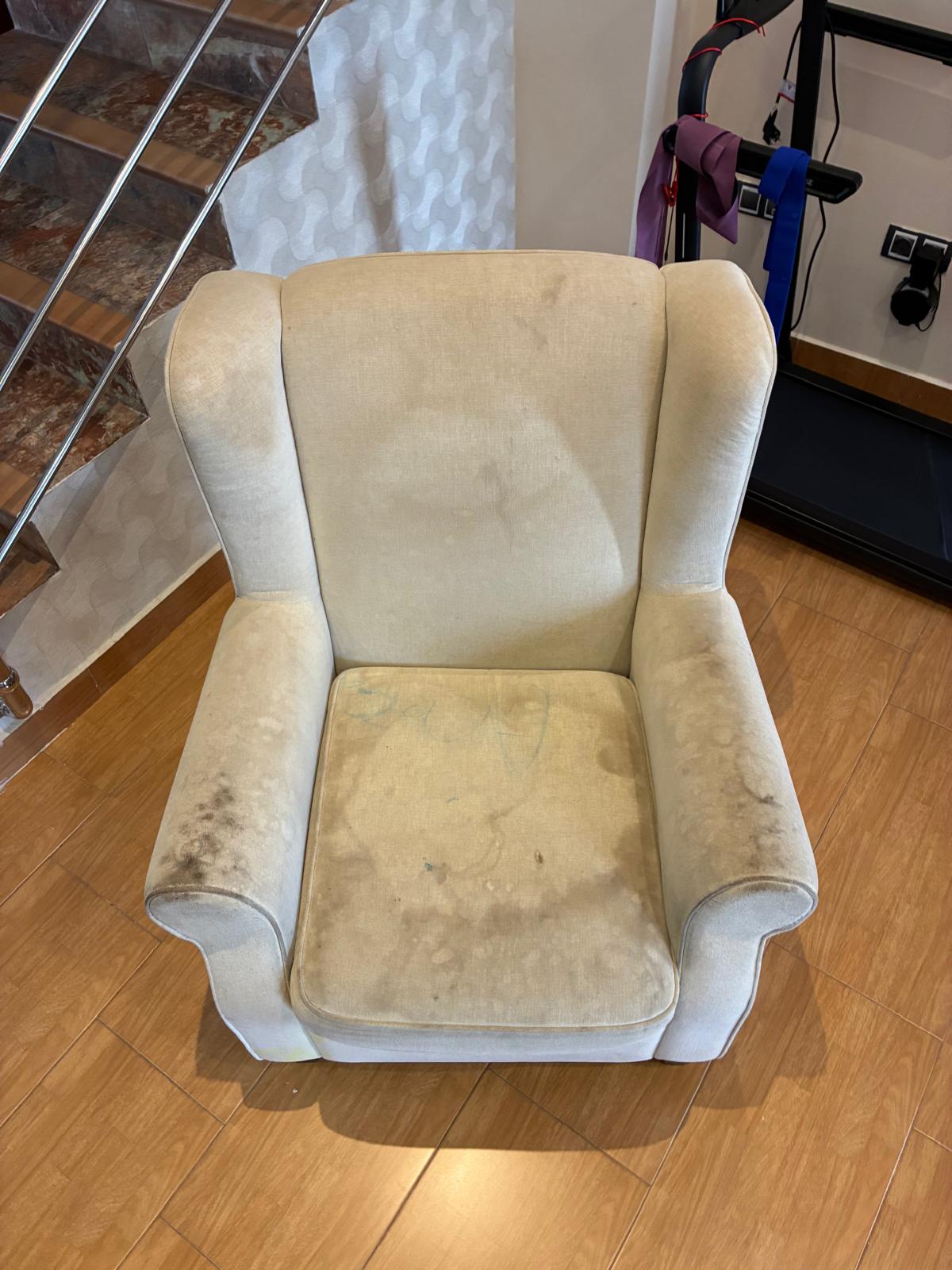 Beige armchair before professional upholstery cleaning by Clean Sur