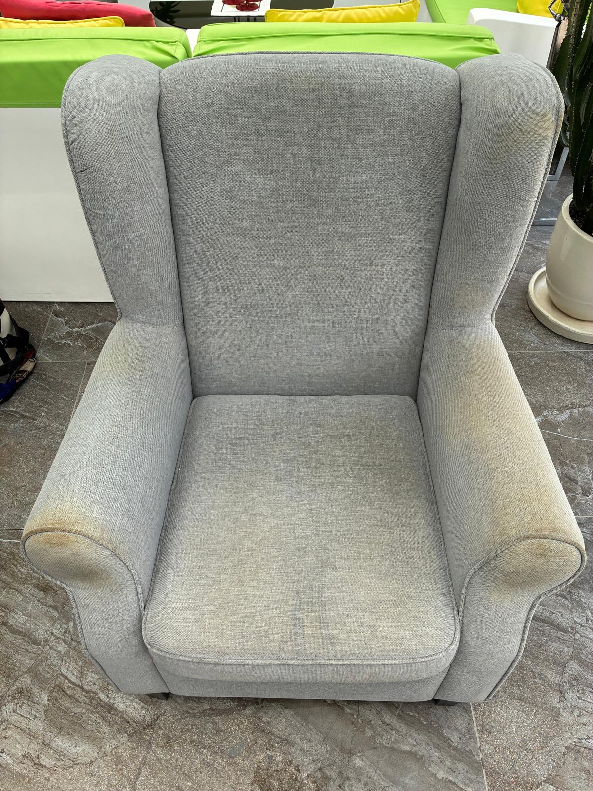 Grey armchair before professional upholstery cleaning by Clean Sur