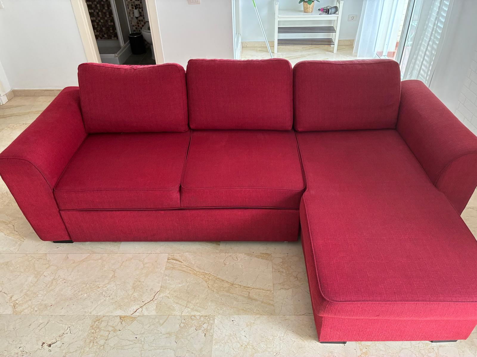 Red sofa after professional upholstery cleaning by Clean Sur